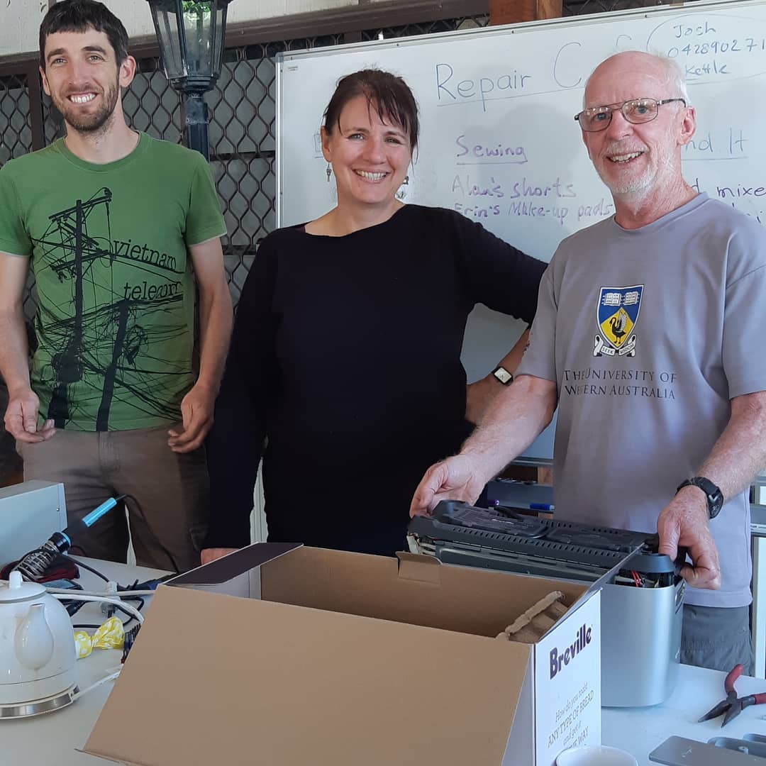 Repairers at work in the Share and Repair café
